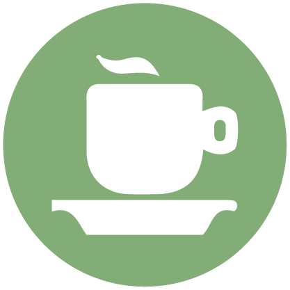 White coffee cup with a saucer on a green background